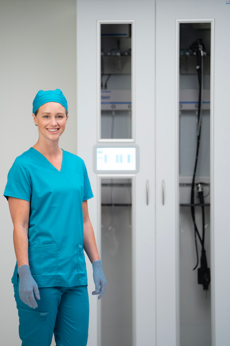 Woman standing in medical uniform