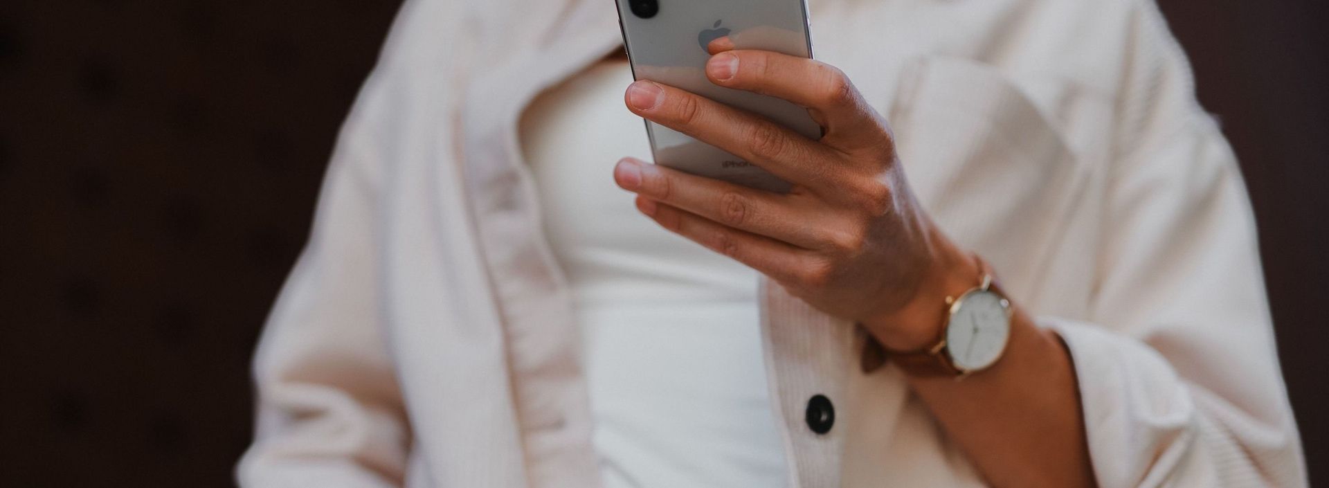 Woman holds iphone